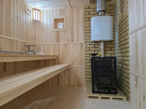 Парная с печью, баком и деревянными полками